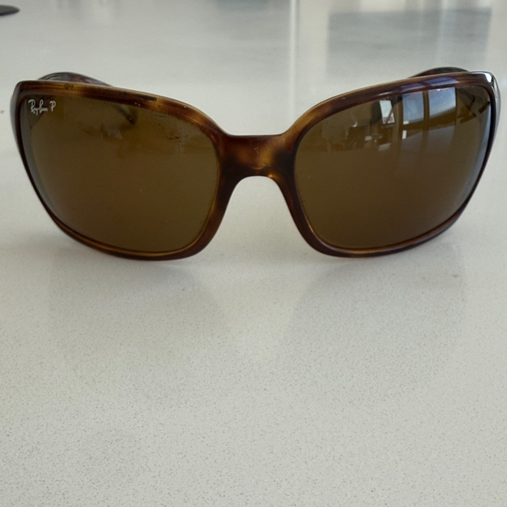 RayBan Polarized sunglasses.  Wrap style. Amber lens. RB4068 642/57